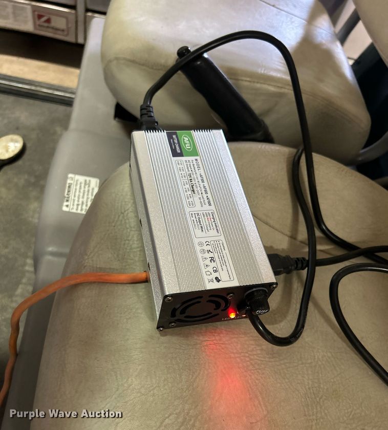 image for item MO9048 2002 Ford Think Neighbor  utility vehicle