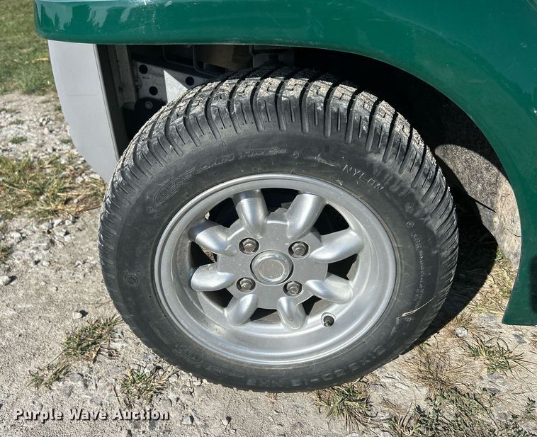 image for item MO9048 2002 Ford Think Neighbor  utility vehicle