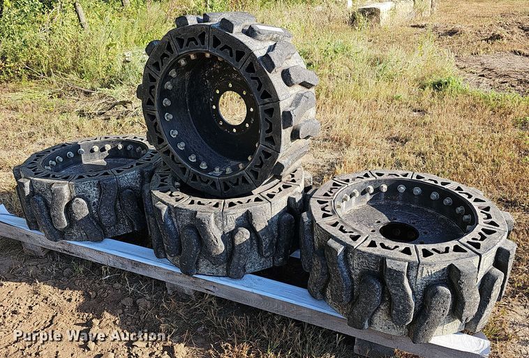image for item NJ9810 (4) Evolution EWRS 12X16.5 skid steer wheels and tires