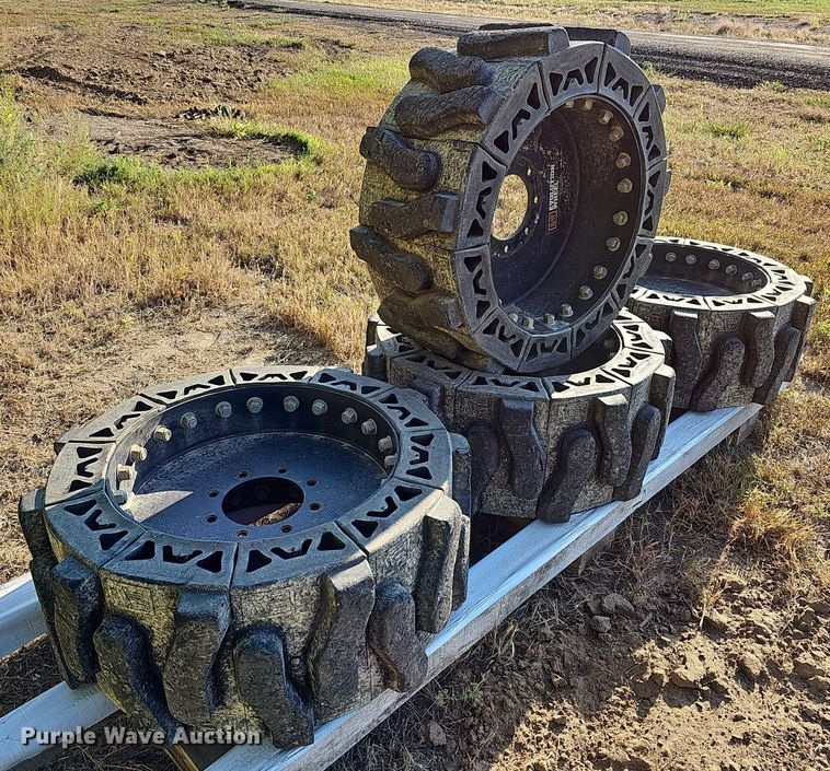 image for item NJ9810 (4) Evolution EWRS 12X16.5 skid steer wheels and tires