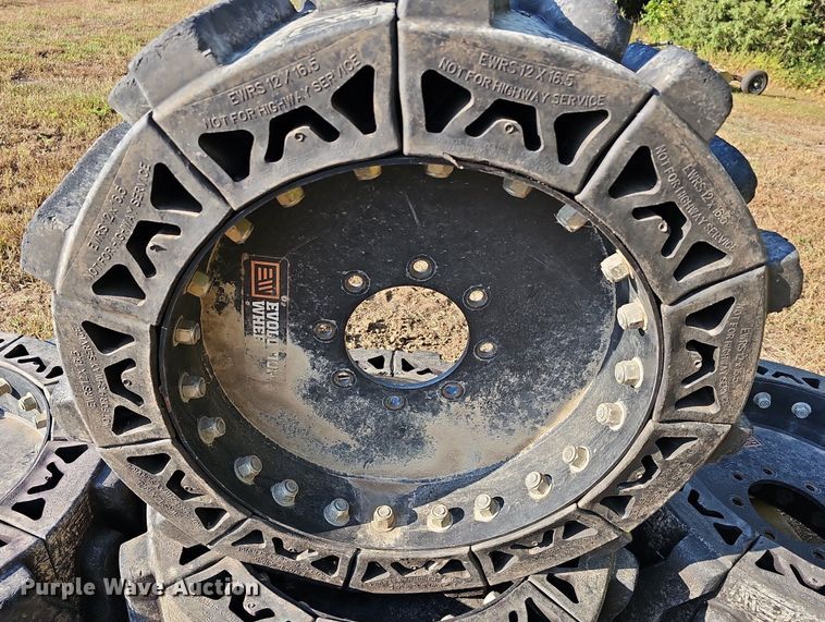 image for item NJ9810 (4) Evolution EWRS 12X16.5 skid steer wheels and tires