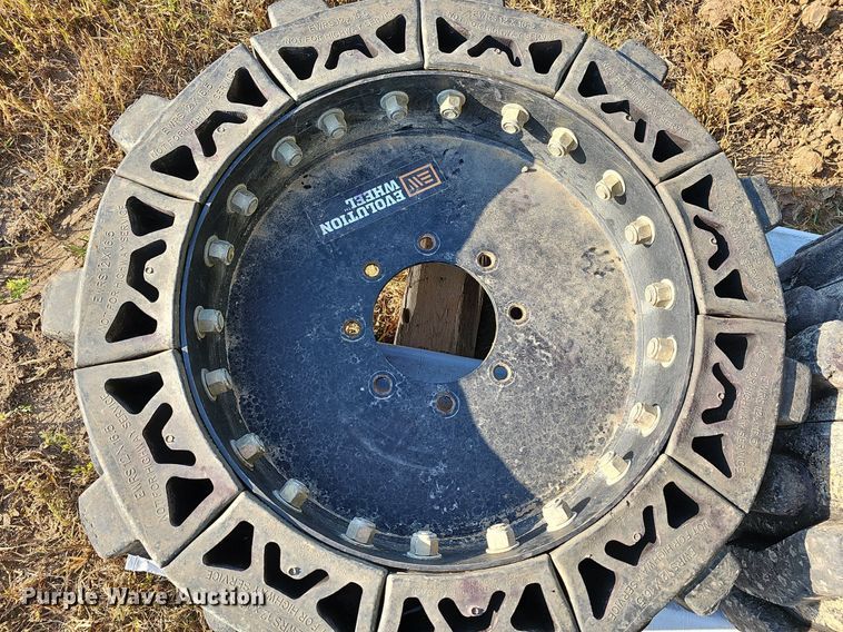 image for item NJ9810 (4) Evolution EWRS 12X16.5 skid steer wheels and tires