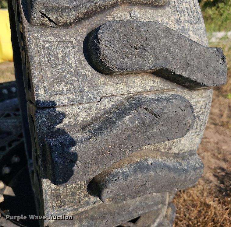 image for item NJ9810 (4) Evolution EWRS 12X16.5 skid steer wheels and tires