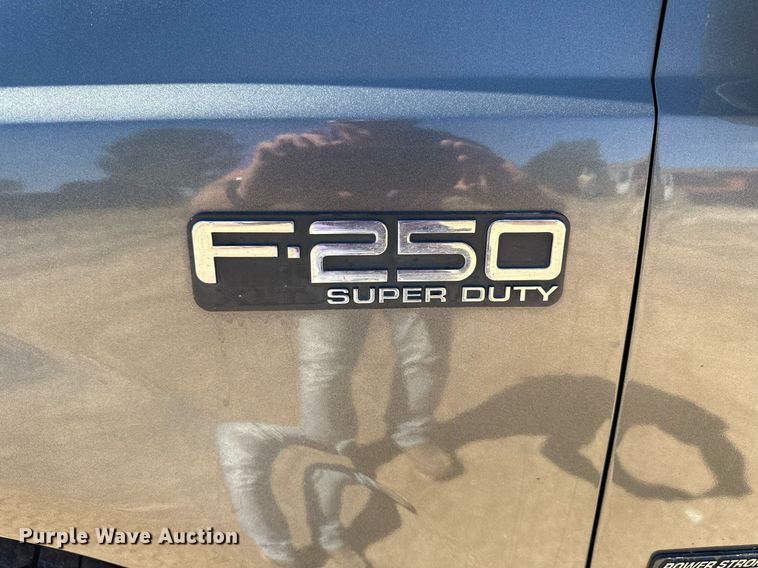 image for item NP9643 2003 Ford F250 Super Duty XLT  SuperCab flatbed pickup truck