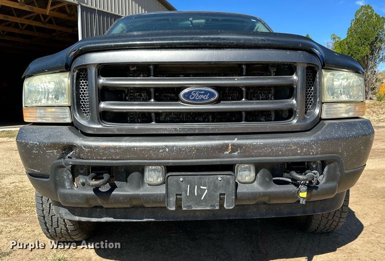 image for item NP9643 2003 Ford F250 Super Duty XLT  SuperCab flatbed pickup truck