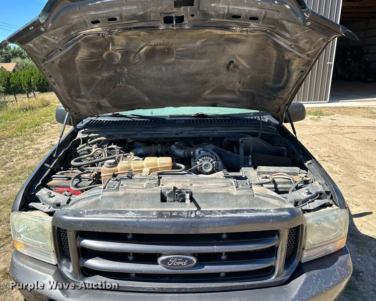 image for item NP9643 2003 Ford F250 Super Duty XLT  SuperCab flatbed pickup truck