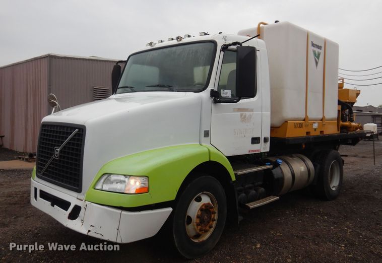 image for item DO3162 2012 Volvo VNM  flatbed truck