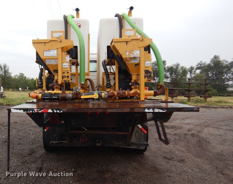 image for item DO3162 2012 Volvo VNM  flatbed truck