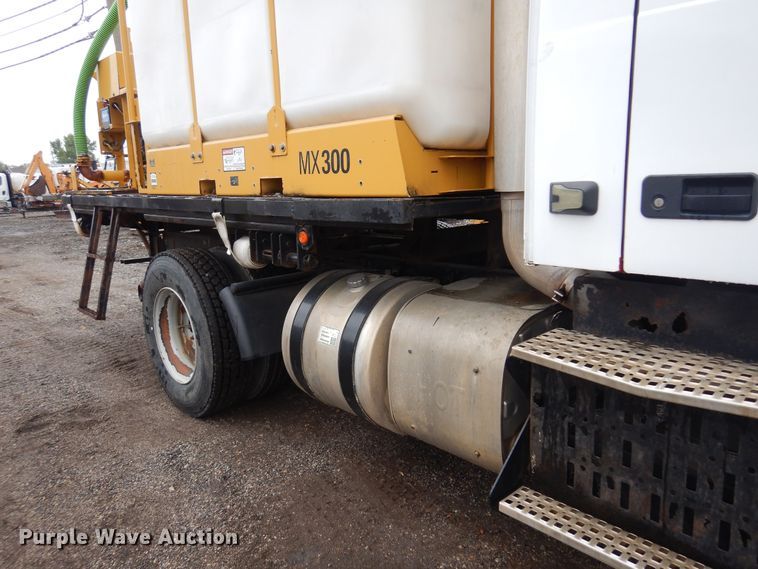 image for item DO3162 2012 Volvo VNM  flatbed truck