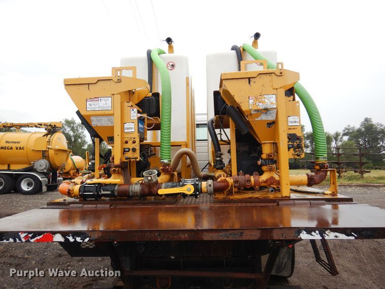 image for item DO3162 2012 Volvo VNM  flatbed truck