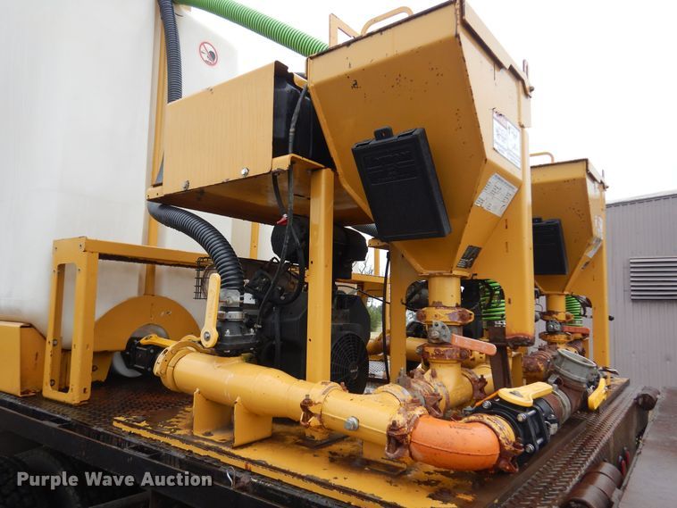 image for item DO3162 2012 Volvo VNM  flatbed truck