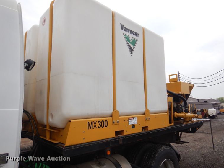 image for item DO3162 2012 Volvo VNM  flatbed truck