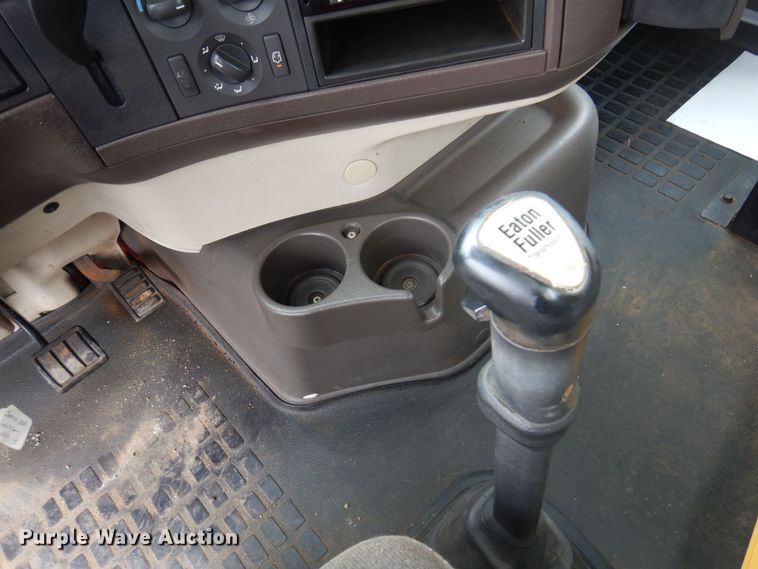 image for item DO3162 2012 Volvo VNM  flatbed truck