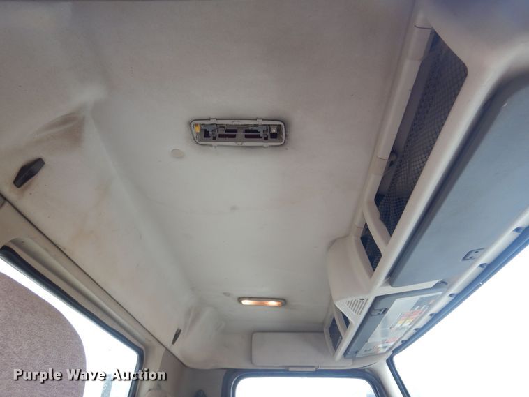 image for item DO3162 2012 Volvo VNM  flatbed truck