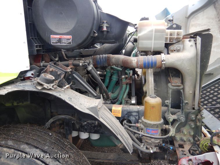 image for item DO3162 2012 Volvo VNM  flatbed truck