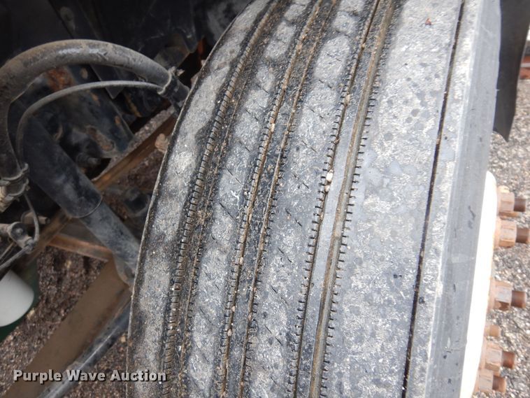 image for item DO3162 2012 Volvo VNM  flatbed truck