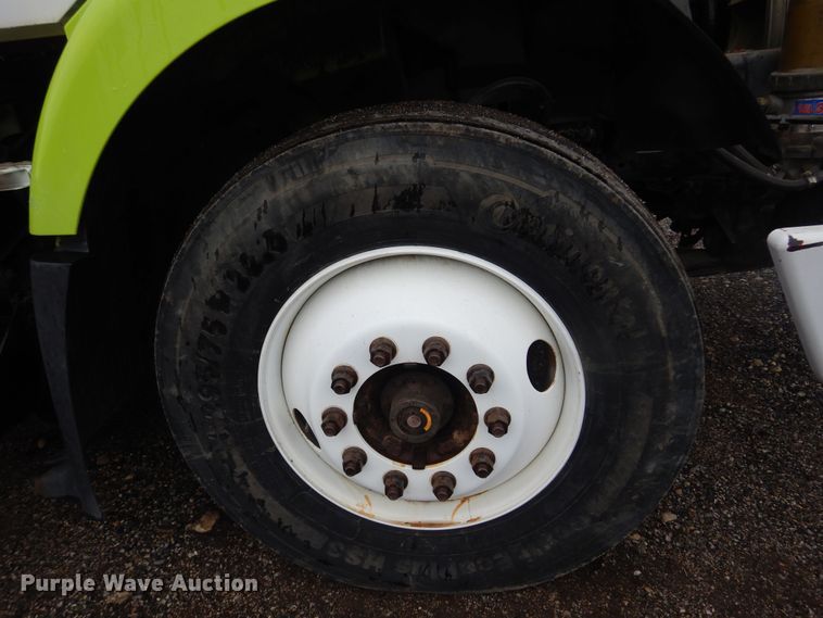 image for item DO3162 2012 Volvo VNM  flatbed truck