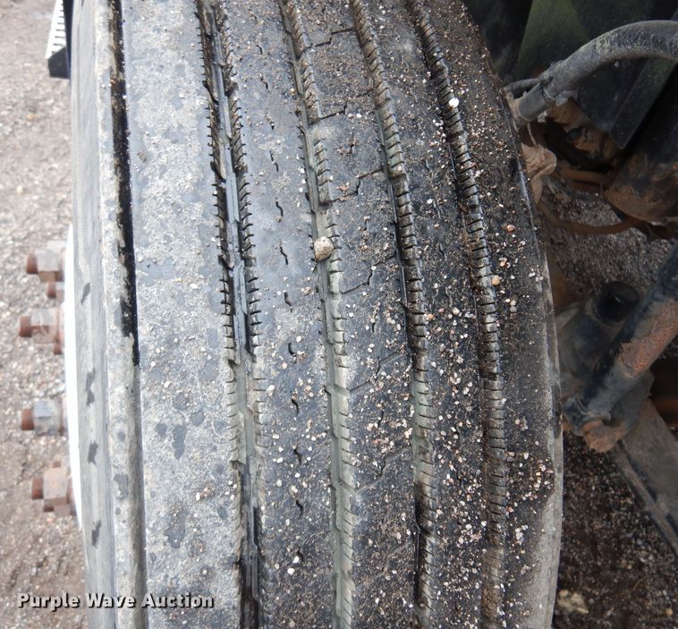 image for item DO3162 2012 Volvo VNM  flatbed truck