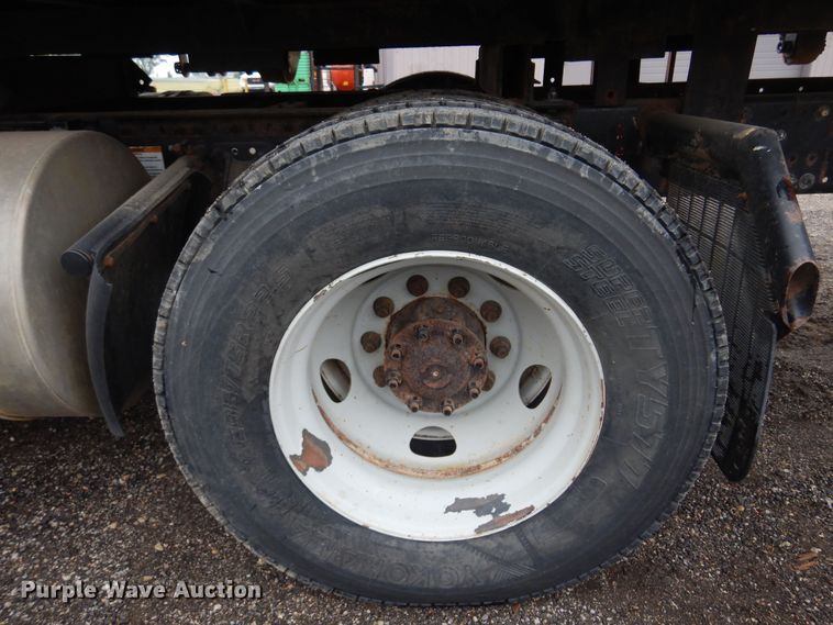 image for item DO3162 2012 Volvo VNM  flatbed truck