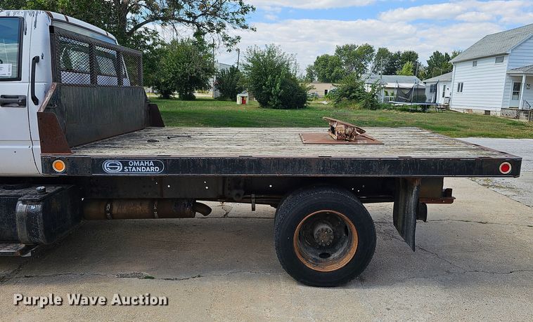 image for item DQ0213 1994 GMC TopKick LoPro  flatbed truck