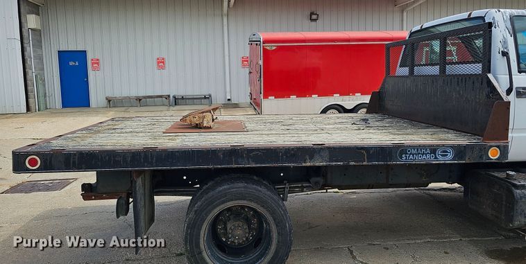 image for item DQ0213 1994 GMC TopKick LoPro  flatbed truck