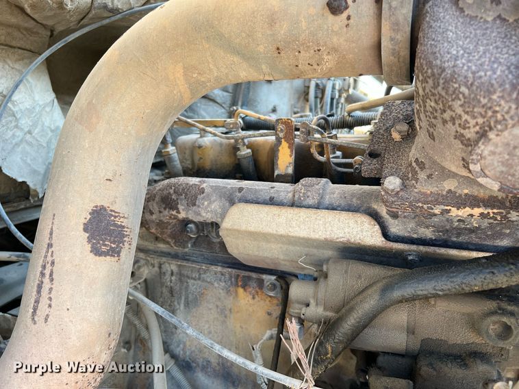 image for item DQ2213 1995 White GMC  vacuum truck