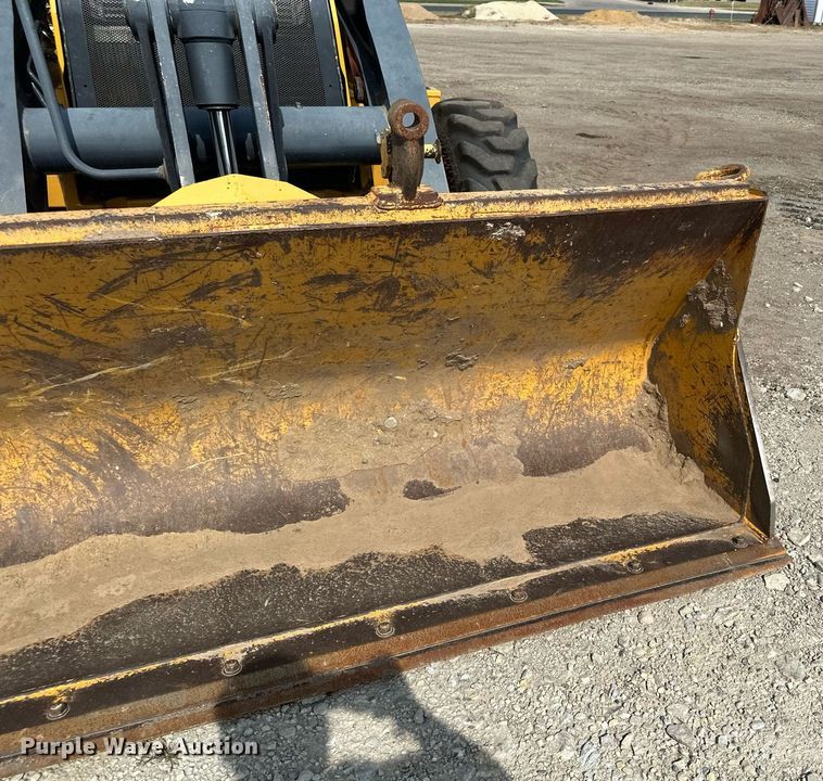 image for item DQ7377 2014 John Deere 310SK  backhoe