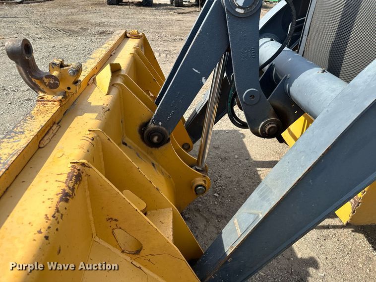 image for item DQ7377 2014 John Deere 310SK  backhoe