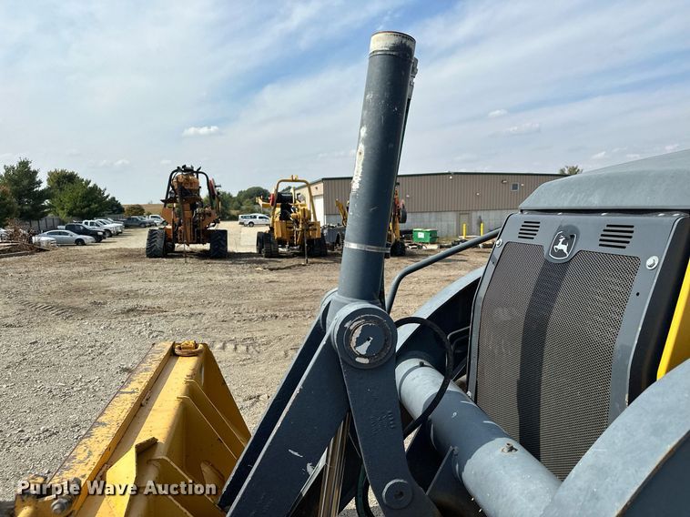 image for item DQ7377 2014 John Deere 310SK  backhoe