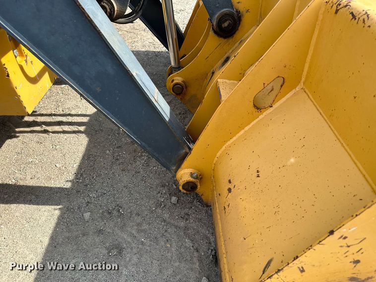 image for item DQ7377 2014 John Deere 310SK  backhoe