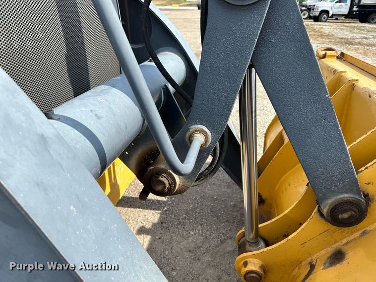 image for item DQ7377 2014 John Deere 310SK  backhoe