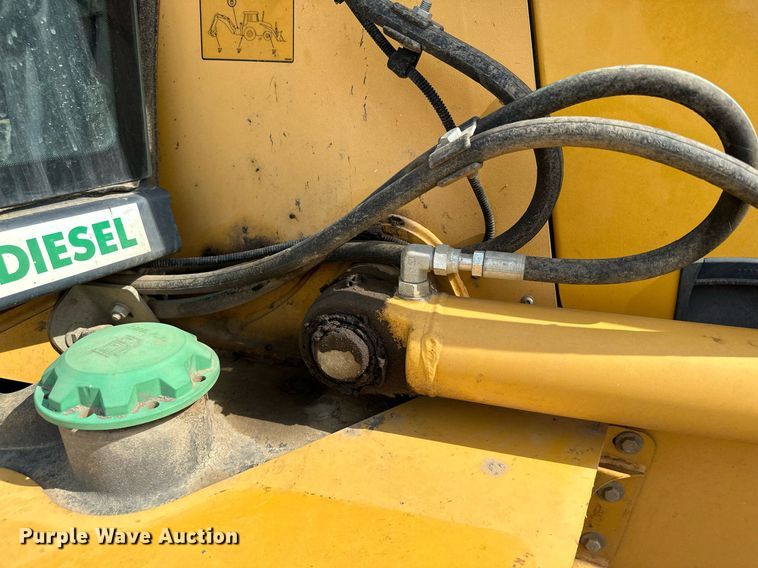 image for item DQ7377 2014 John Deere 310SK  backhoe