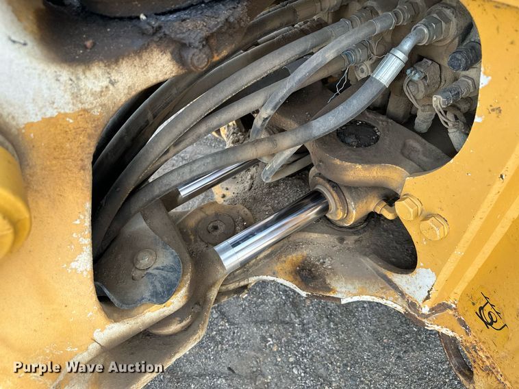 image for item DQ7377 2014 John Deere 310SK  backhoe