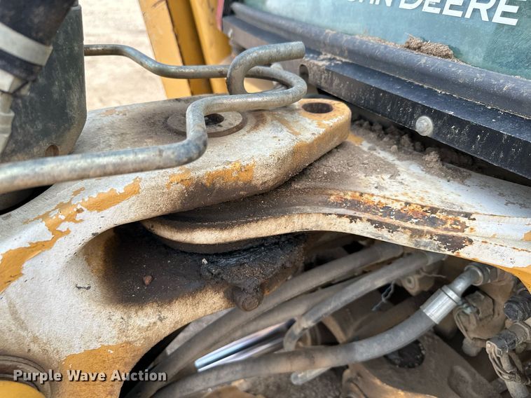 image for item DQ7377 2014 John Deere 310SK  backhoe