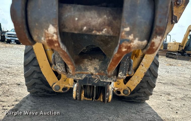 image for item DQ7377 2014 John Deere 310SK  backhoe