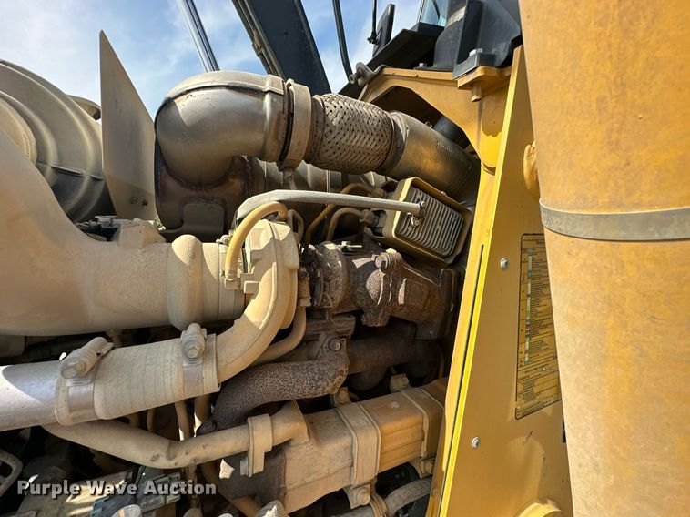 image for item DQ7377 2014 John Deere 310SK  backhoe