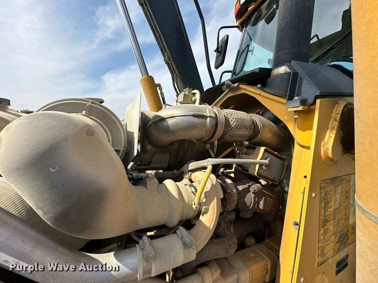 image for item DQ7377 2014 John Deere 310SK  backhoe