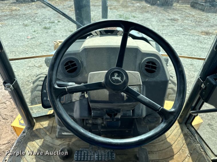 image for item DQ7377 2014 John Deere 310SK  backhoe