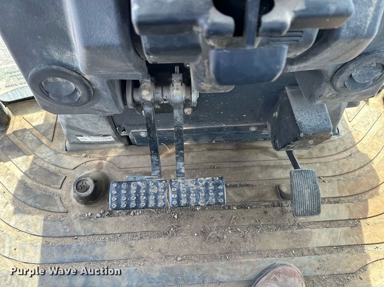 image for item DQ7377 2014 John Deere 310SK  backhoe