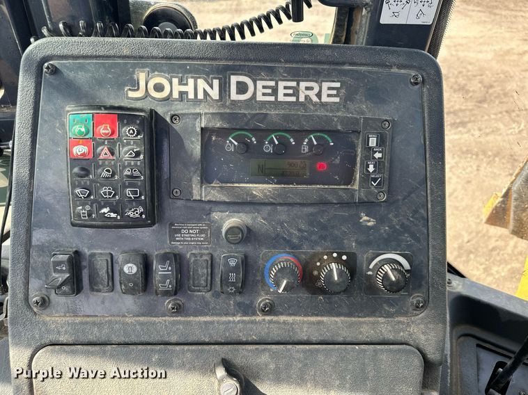 image for item DQ7377 2014 John Deere 310SK  backhoe