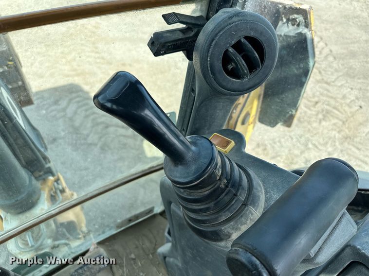 image for item DQ7377 2014 John Deere 310SK  backhoe