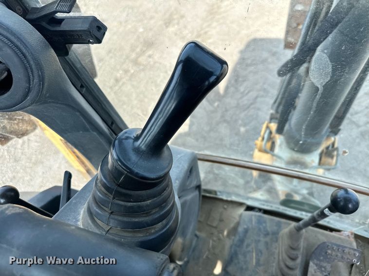 image for item DQ7377 2014 John Deere 310SK  backhoe