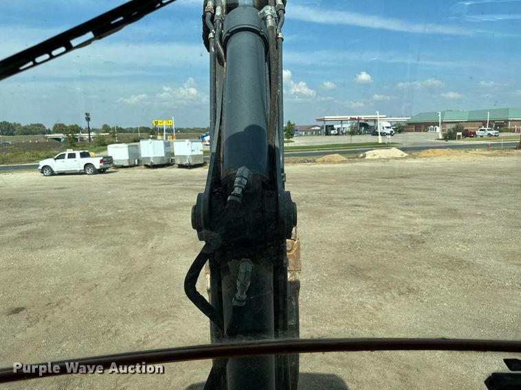 image for item DQ7377 2014 John Deere 310SK  backhoe