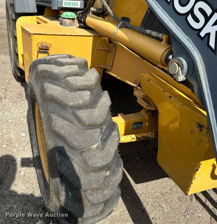 image for item DQ7377 2014 John Deere 310SK  backhoe