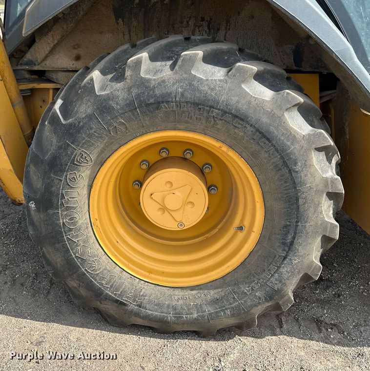 image for item DQ7377 2014 John Deere 310SK  backhoe