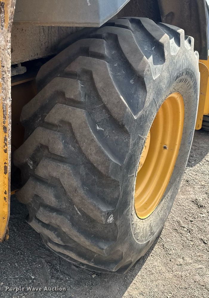 image for item DQ7377 2014 John Deere 310SK  backhoe