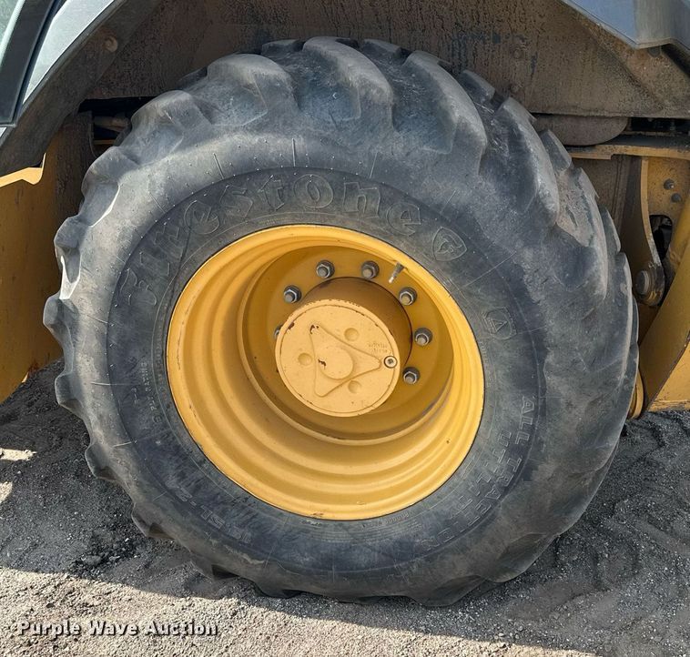 image for item DQ7377 2014 John Deere 310SK  backhoe