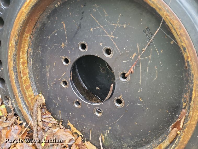 image for item JE9507 (4) 31 x 10-20 solid skid steer wheels and tires