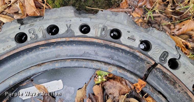 image for item JE9507 (4) 31 x 10-20 solid skid steer wheels and tires