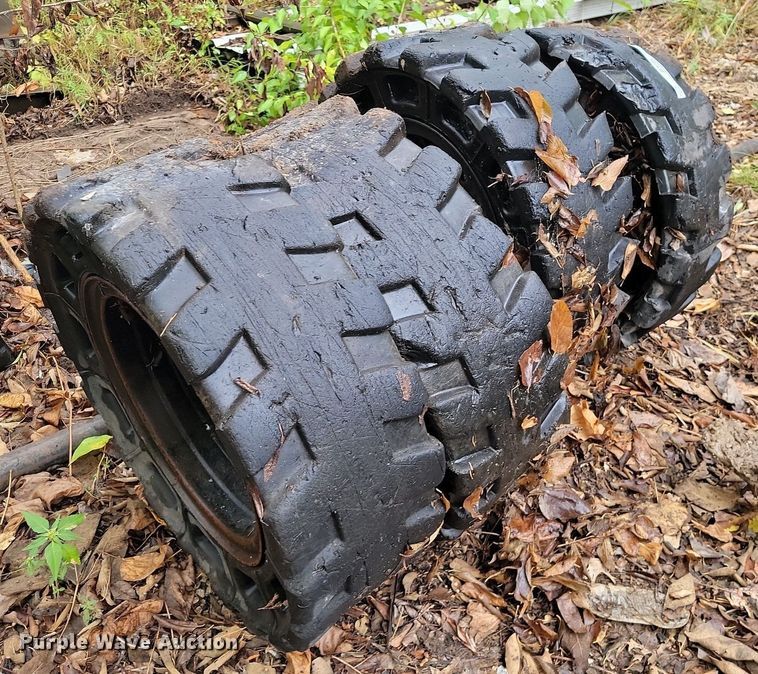 image for item JE9508 (4) 31 x 10-20 solid skid steer tires and wheels